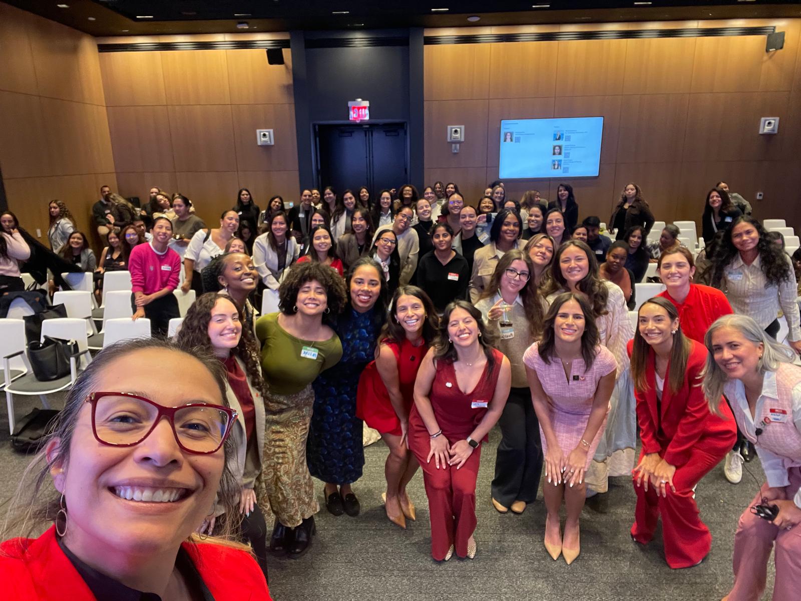 A group selfie with the speakers and event attendees